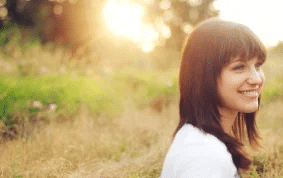 woman outside smiling